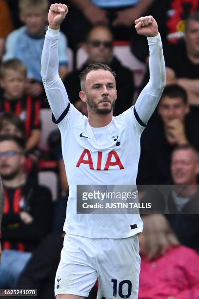 Tottenham Hotspur's English midfielder James Maddison celebrates after scoring the opening goal during the English Premier League football match...