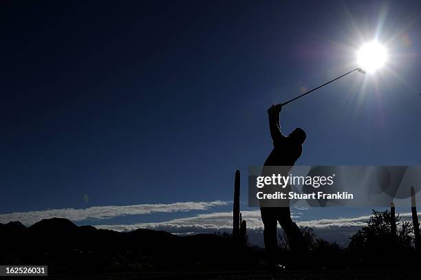 Hunter Mahan hits his tee shot on the ninth hole during the semifinal round of the World Golf Championships - Accenture Match Play at the Golf Club...