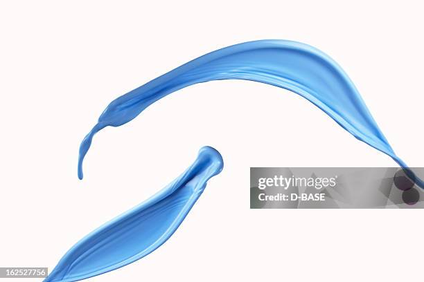 splashing of blue paints - oil paint stock pictures, royalty-free photos & images