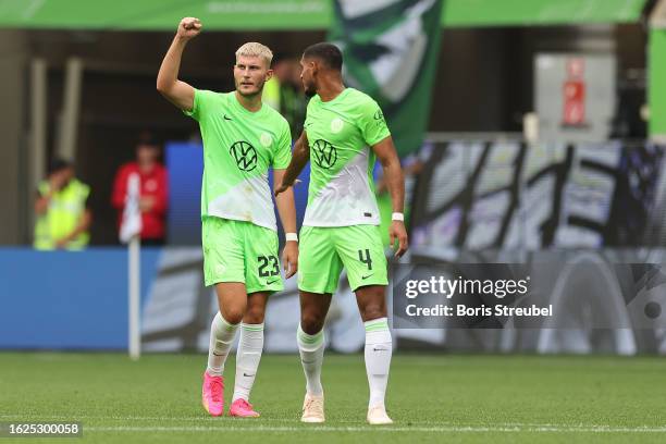Jonas Wind of VfL Wolfsburg celebrates after scoring the team's second goal during the Bundesliga match between VfL Wolfsburg and 1. FC Heidenheim...