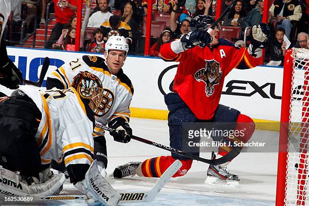 Tomas Kopecky of the Florida Panthers celebrates his goal against Goaltender Tuukka Rask and Andrew Ference of the Boston Bruins at the BB&T Center...