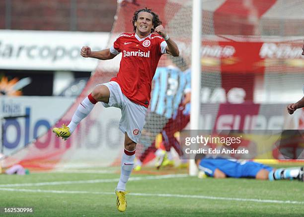 Diego Forlan, player of Internacional celebrates a goal during a match between Gremio and Internacional as part of the Gaucho championship at...