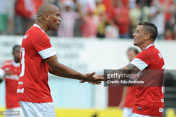 Rodrigo Moledo and D'Alessandro of Internacional celebrates a goal during a match between Gremio and Internacional as part of the Gaucho championship...