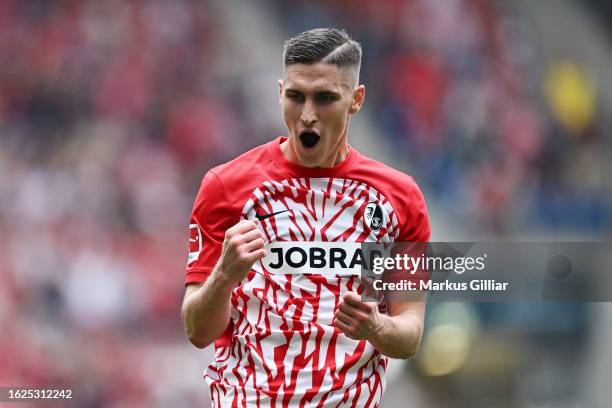 Roland Sallai of Sport-Club Freiburg celebrates after scoring the team's second goal during the Bundesliga match between TSG Hoffenheim and...