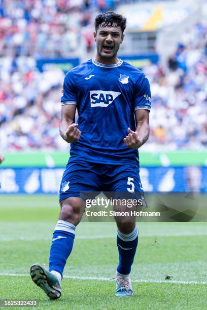 Ozan Kabak of Hoffenheim celebrates his side's first goal during the Bundesliga match between TSG Hoffenheim and Sport-Club Freiburg at PreZero-Arena...