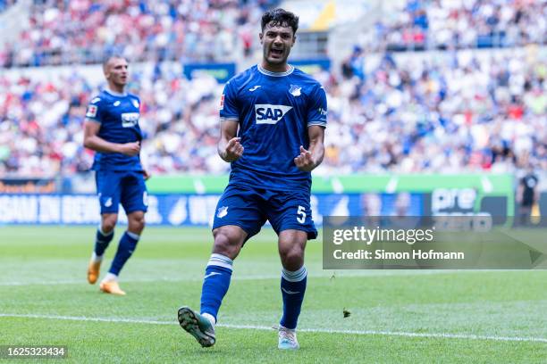 Ozan Kabak of Hoffenheim celebrates his side's first goal during the Bundesliga match between TSG Hoffenheim and Sport-Club Freiburg at PreZero-Arena...