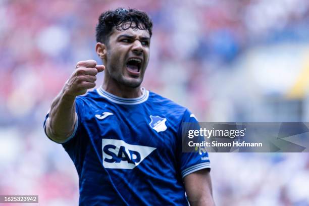 Ozan Kabak of Hoffenheim celebrates his side's first goal during the Bundesliga match between TSG Hoffenheim and Sport-Club Freiburg at PreZero-Arena...