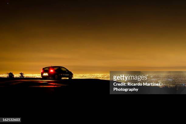 night view - car parked stock pictures, royalty-free photos & images