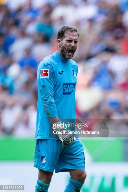 Oliver Baumann of Hoffenheim reacts during the Bundesliga match between TSG Hoffenheim and Sport-Club Freiburg at PreZero-Arena on August 19, 2023 in...