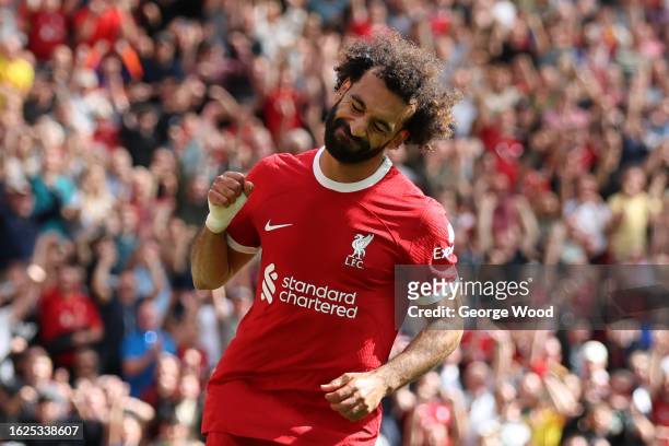 Mohamed Salah of Liverpool celebrates after scoring the team's second goal during the Premier League match between Liverpool FC and AFC Bournemouth...