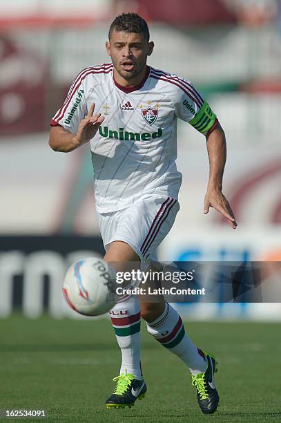 Edinho of Fluminense runs after the ball during the match between Fluminense and Madureira as part of the Carioca Championship 2013 at Bonita Stadium...