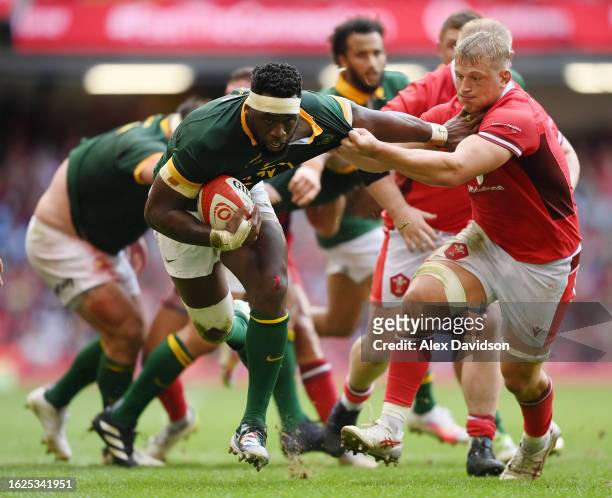 Siya Kolisi of South Africa breaks through contact during the Summer International match between Wales and South Africa at Principality Stadium on...