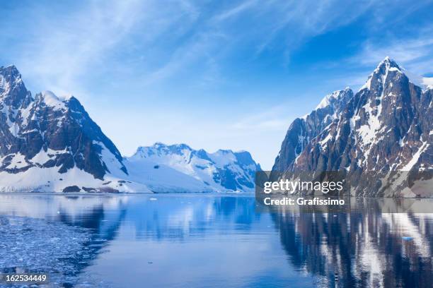 antarctica lemaire channel snowy mountain - antarctica stock pictures, royalty-free photos & images