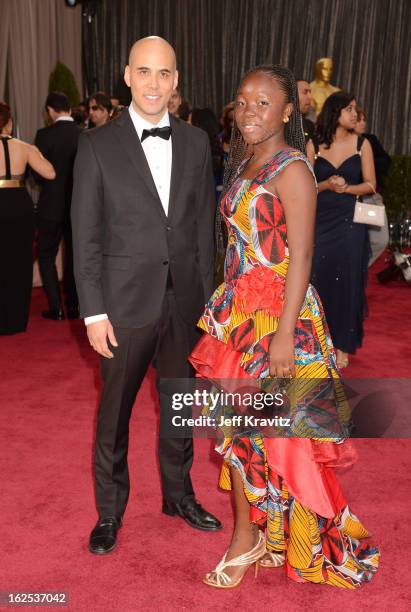 Actress Rachel Mwanza and filmmaker Kim Nguyen arrive at the Oscars at Hollywood & Highland Center on February 24, 2013 in Hollywood, California.