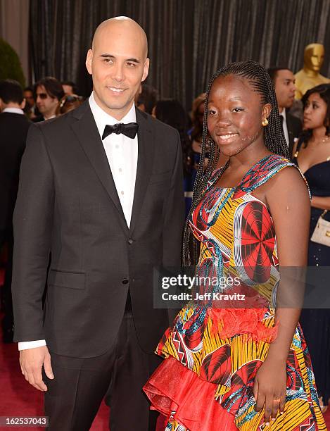 Director Kim Nguyen and actress Rachel Mwanza arrives at the Oscars at Hollywood & Highland Center on February 24, 2013 in Hollywood, California.