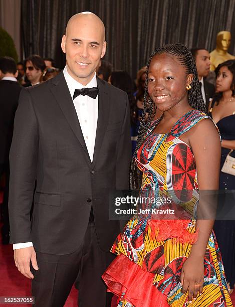 Actress Rachel Mwanza and filmmaker Kim Nguyen arrive at the Oscars at Hollywood & Highland Center on February 24, 2013 in Hollywood, California.