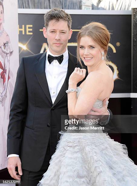 Actress Amy Adams and Darren Le Gallo arrive at the Oscars at Hollywood & Highland Center on February 24, 2013 in Hollywood, California.