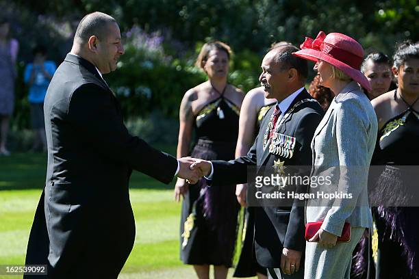 King Tupou VI is greeted by Governor-General Sir Jerry Mateparae and Lady Janine Mateparae during a State Welcome at Government House on February 25,...