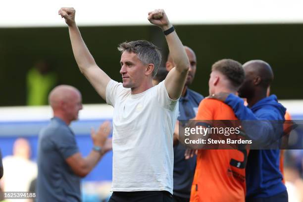 Ipswich Town manager Kieran McKenna celebrates in front of the Ipswich supporters after the Sky Bet Championship match between Queens Park Rangers...