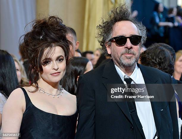 Actress Helena Bonham Carter and director Tim Burton arrive at the Oscars at Hollywood & Highland Center on February 24, 2013 in Hollywood,...