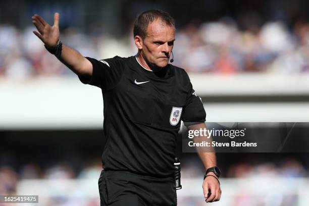 The Referee, Geoff Eltringham gives a decision during the Sky Bet Championship match between Queens Park Rangers and Ipswich Town at Loftus Road on...