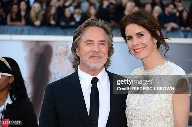 Actor Don Johnson and wife Kelley Phleger arrive on the red carpet for the 85th Annual Academy Awards on February 24, 2013 in Hollywood, California....