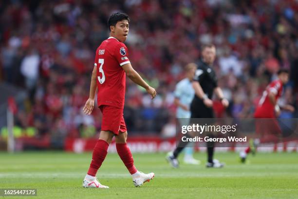 Wataru Endo of Liverpool looks on during the Premier League match between Liverpool FC and AFC Bournemouth at Anfield on August 19, 2023 in...