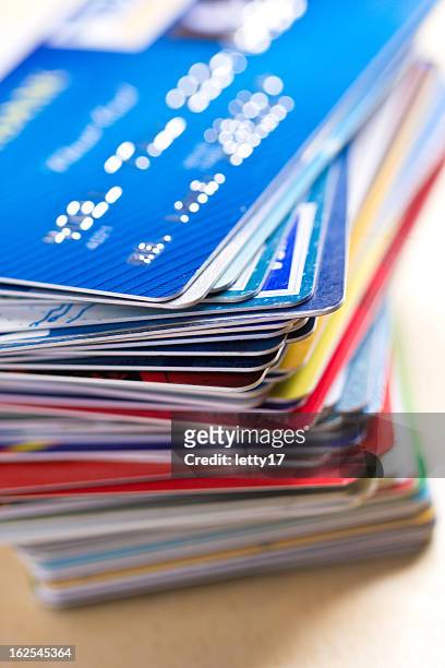 credit cards - credit card and stapel stockfoto's en -beelden