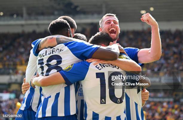 Adam Webster of Brighton & Hove Albion celebrates after team mate Solly March scored the team's fourth goal during the Premier League match between...