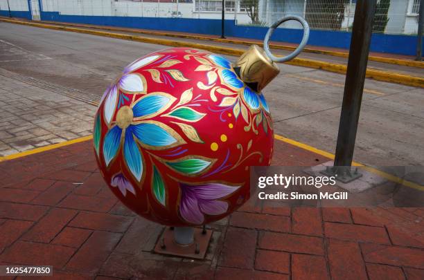 christmas bauble statue, chignahuapan, puebla, mexico - chignahuapan stock pictures, royalty-free photos & images