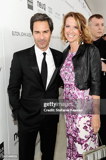 Actor Eric McCormack and Janet Holden attend Chopard at 21st Annual Elton John AIDS Foundation Academy Awards Viewing Party at West Hollywood Park on...