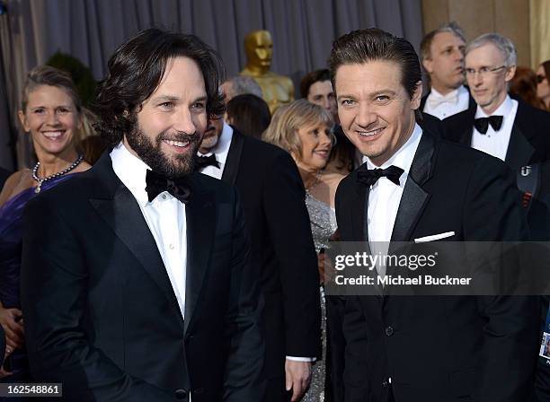 Actors Paul Rudd and Jeremy Renner arrive at the Oscars at Hollywood & Highland Center on February 24, 2013 in Hollywood, California.