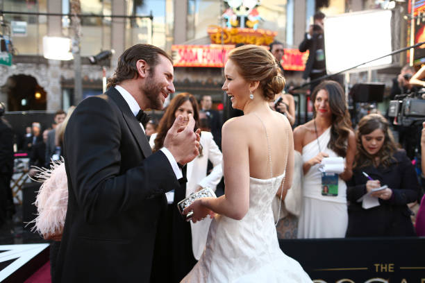 Actors Bradley Cooper and Jennifer Lawrence arrive at the Oscars held at Hollywood & Highland Center on February 24, 2013 in Hollywood, California.