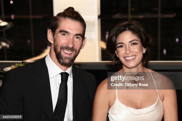Michael Phelps and Nicole Johnson attend the Harold & Carole Pump Foundation 2023 Gala at The Beverly Hilton on August 18, 2023 in Beverly Hills,...