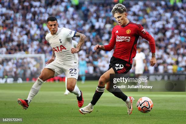 Alejandro Garnacho of Manchester United runs with the ball whilst under pressure from Pedro Porro of Tottenham Hotspur during the Premier League...