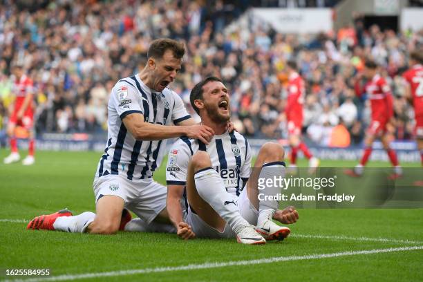 John Swift of West Bromwich Albion celebrates scoring a goal with Jayson Molumby during the Sky Bet Championship match between West Bromwich Albion...