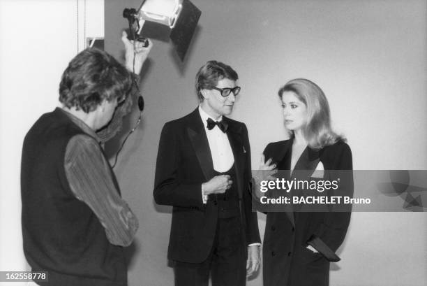 Actress Catherine Deneuve poses in YSL fashions with designer Yves Saint Laurent in a photo-shoot by German photographer Helmut Newton , 16th...