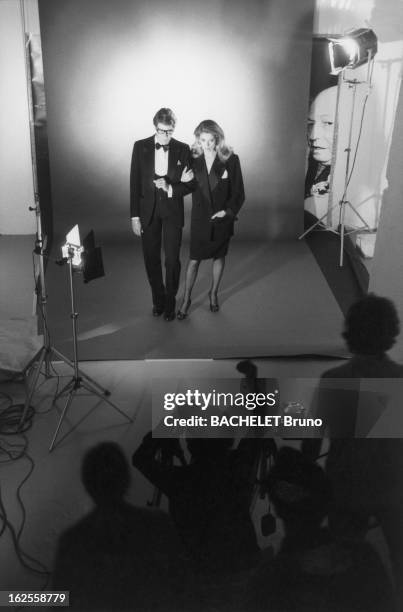 Actress Catherine Deneuve poses in YSL fashions with designer Yves Saint Laurent in a photo-shoot by German photographer Helmut Newton , 16th...