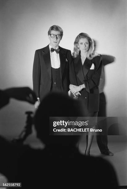 Actress Catherine Deneuve poses with fashion designer Yves Saint Laurent in a photo-shoot by German photographer Helmut Newton , 16th November 1981....