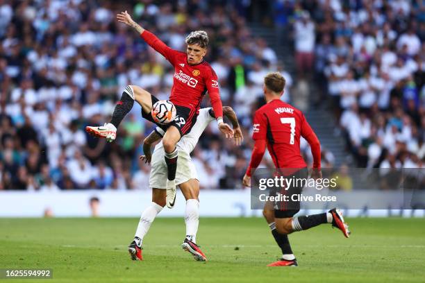 Alejandro Garnacho of Manchester United jumps for the ball during the Premier League match between Tottenham Hotspur and Manchester United at...