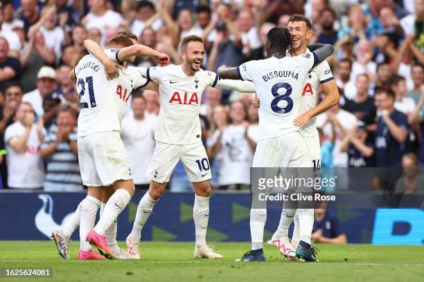 James Maddison of Tottenham Hotspur celebrates with teammates after teammate Ben Davies scores the team's second goal during the Premier League match...