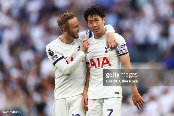 James Maddison of Tottenham Hotspur celebrates with teammate Heung-Min Son following the team's victory during the Premier League match between...