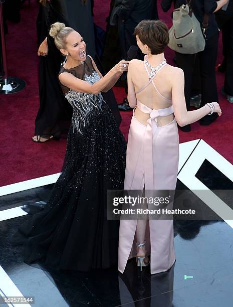 Oscars Red Carpet Live Host Kristin Chenoweth interviews actress Anne Hathaway at the Oscars held at Hollywood & Highland Center on February 24, 2013...