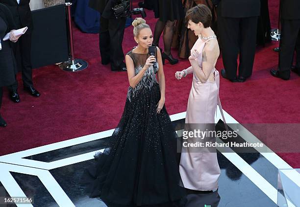 Oscars Red Carpet Live Host Kristin Chenoweth interviews actress Anne Hathaway at the Oscars held at Hollywood & Highland Center on February 24, 2013...