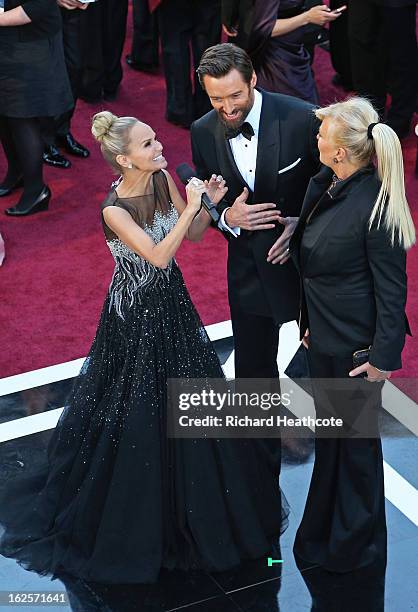 Actress Kristin Chenoweth interviews actor Actor Hugh Jackman and wife Deborah Lee Furness at the Oscars held at Hollywood & Highland Center on...