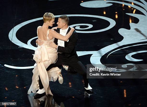 Actress Charlize Theron and actor Channing Tatum dance onstage during the Oscars held at the Dolby Theatre on February 24, 2013 in Hollywood,...