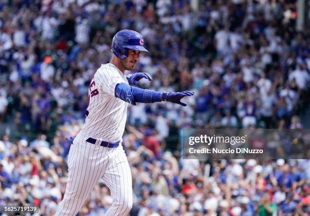 Cody Bellinger of the Chicago Cubs hits a home run during the third inning of a game against the Kansas City Royals at Wrigley Field on August 19,...