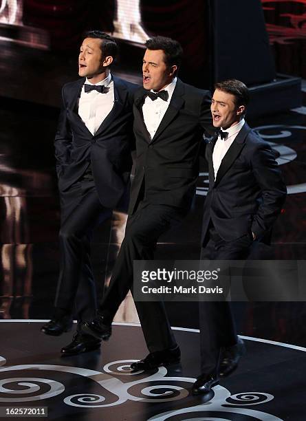 Actor Joseph Gordon-Levitt, Host Seth MacFarlane, and actor Daniel Radcliffe perform onstage during the Oscars held at the Dolby Theatre on February...