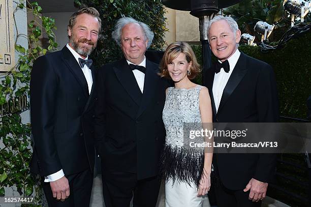 Artist Rainer Andreesen, editor-in-chief of Vanity Fair Graydon Carter, Anna Carter, and actor Victor Garber arrive for the 2013 Vanity Fair Oscar...