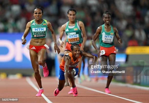 Sifan Hassan of Team Netherlands falls in the Women's 10000m Final during day one of the World Athletics Championships Budapest 2023 at National...